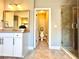 Bathroom with a glass shower, vanity and enclosed water closet at 4071 Woodward Walk Ln, Suwanee, GA 30024
