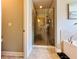 Modern bathroom featuring a glass shower with tile surround and soaking tub at 4071 Woodward Walk Ln, Suwanee, GA 30024