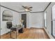 Bright bedroom with hardwood floors, ceiling fan, and natural light at 4576 Dorset Circle, Decatur, GA 30035