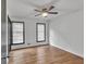 Bright bedroom with hardwood floors, ceiling fan, and natural light at 4576 Dorset Circle, Decatur, GA 30035