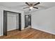 Bedroom featuring hardwood floors, a closet and two entryways at 4576 Dorset Circle, Decatur, GA 30035