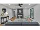 Modern living room featuring hardwood floors, a fireplace and a large window at 4576 Dorset Circle, Decatur, GA 30035