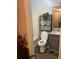 Cozy bathroom featuring a toilet, vanity with granite countertop, and plant for a fresh touch at 497 Natasha Dr, Auburn, GA 30011