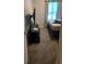 Small bedroom with basic furnishings and a window at 497 Natasha Dr, Auburn, GA 30011