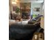 Comfortable living room with stone fireplace and plush sectional sofa at 497 Natasha Dr, Auburn, GA 30011
