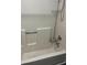 Clean shower stall showing storage solutions at 497 Natasha Dr, Auburn, GA 30011
