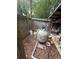 Pool equipment and supplies area with fencing and surrounding natural elements at 3 Perthshire Dr, Peachtree City, GA 30269