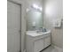 Simple bathroom with a single vanity, white cabinetry, and neutral paint at 3130 Jorden Crest Ct, Lawrenceville, GA 30044