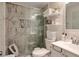 Updated bathroom featuring a glass-enclosed shower, modern vanity, and stylish marble accents at 3130 Jorden Crest Ct, Lawrenceville, GA 30044