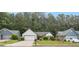 Charming home exterior featuring a well-maintained front yard, attached garage, and inviting curb appeal at 3130 Jorden Crest Ct, Lawrenceville, GA 30044