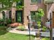 Welcoming brick home boasts a charming front entrance, manicured landscaping, and an inviting front patio at 5105 Tynewick Ne Trce, Roswell, GA 30075