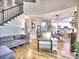 Open-concept living area with staircase at 5105 Tynewick Ne Trce, Roswell, GA 30075