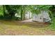 Backyard with patio and trees, offering privacy at 76 Burbank Dr, Atlanta, GA 30314