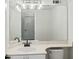 This bathroom features a white vanity, bright mirror, and a standard toilet at 76 Burbank Dr, Atlanta, GA 30314