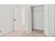 Bedroom with open closet and neutral carpet at 76 Burbank Dr, Atlanta, GA 30314
