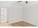 Bright bedroom with hardwood floors and an ensuite bathroom at 76 Burbank Dr, Atlanta, GA 30314