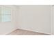 Brightly lit bedroom with neutral carpet and blinds at 76 Burbank Dr, Atlanta, GA 30314