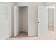 Bedroom with closet and view to another room at 76 Burbank Dr, Atlanta, GA 30314
