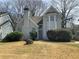 Charming two-story home featuring a well-maintained front yard and brick chimney at 76 Burbank Dr, Atlanta, GA 30314