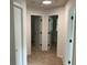 Hallway featuring neutral walls and carpet flooring leading to open doors at 76 Burbank Dr, Atlanta, GA 30314