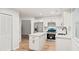Stylish kitchen with white cabinetry, stainless steel appliances, and a functional island at 76 Burbank Dr, Atlanta, GA 30314