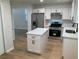 Updated kitchen with modern island, stainless appliances, and durable countertops at 76 Burbank Dr, Atlanta, GA 30314