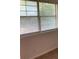 Bright bedroom view of a window with blinds and trees in the background at 76 Burbank Dr, Atlanta, GA 30314