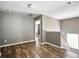 Spacious living room boasts hardwood floors and stairs leading to the upper level at 7698 Hansel Ln, Lithonia, GA 30058