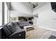 Open-concept living room seamlessly connects to the kitchen and dining area at 7698 Hansel Ln, Lithonia, GA 30058