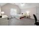 Bright bedroom with a vaulted ceiling, a window, and neutral carpet at 900 Edgewater Nw Dr, Atlanta, GA 30328