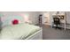 Bedroom with neutral walls, desk, and neutral carpet in a house listing at 900 Edgewater Nw Dr, Atlanta, GA 30328