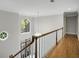 Hallway with hardwood floors, lots of natural light and a view of the front door and entry at 900 Edgewater Nw Dr, Atlanta, GA 30328