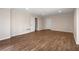 Spacious room with wood floors, neutral colors and great natural light at 900 Edgewater Nw Dr, Atlanta, GA 30328