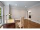 Bright office space with hardwood flooring, natural light, and classic desk with executive chair at 900 Edgewater Nw Dr, Atlanta, GA 30328