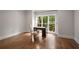 Bright office space with hardwood flooring, natural light, and classic desk with executive chair at 900 Edgewater Nw Dr, Atlanta, GA 30328