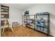 Organized storage room featuring wire shelving and wood look floors at 900 Edgewater Nw Dr, Atlanta, GA 30328