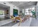 Comfortable lobby area with modern furniture and large windows providing ample natural light at 1360 Peter Haughton Nw Way, Atlanta, GA 30318