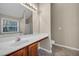 Well-lit bathroom with a spacious vanity, soaking tub, and large mirror, offering comfort and style at 1538 Park Grove Dr, Lawrenceville, GA 30046