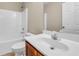 Bathroom with a toilet, sink, vanity, mirror and a shower-tub combo at 1538 Park Grove Dr, Lawrenceville, GA 30046