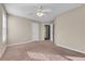 View of a bedroom featuring carpeted floors and neutral paint at 1538 Park Grove Dr, Lawrenceville, GA 30046