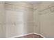 Walk-in closet offering ample storage with built-in shelving, ideal for organizing your wardrobe at 1538 Park Grove Dr, Lawrenceville, GA 30046