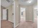 Hallway with access to multiple rooms in the home at 1538 Park Grove Dr, Lawrenceville, GA 30046