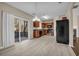 Spacious kitchen and dining area with stainless steel appliances and sliding glass doors at 1538 Park Grove Dr, Lawrenceville, GA 30046