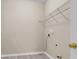 Interior laundry room with shelving for storage at 1538 Park Grove Dr, Lawrenceville, GA 30046