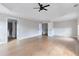 Large bedroom featuring a tray ceiling, multiple windows, and two doorways at 20 Daniel Crk, Sugar Hill, GA 30518