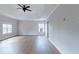 Bright, airy bedroom featuring wood floors, neutral walls, and tray ceiling at 20 Daniel Crk, Sugar Hill, GA 30518