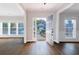 Elegant foyer boasting hardwood floors, and a clear view through the open front door at 20 Daniel Crk, Sugar Hill, GA 30518