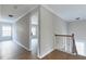 Hallway with wood floors, lots of natural light, and white trim at 20 Daniel Crk, Sugar Hill, GA 30518