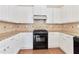 Modern kitchen with stainless steel appliances, granite countertops and ample cabinet space at 20 Daniel Crk, Sugar Hill, GA 30518