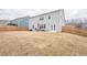 Spacious backyard showing a fenced yard and back of home at 2718 Serena Way, Atlanta, GA 30331